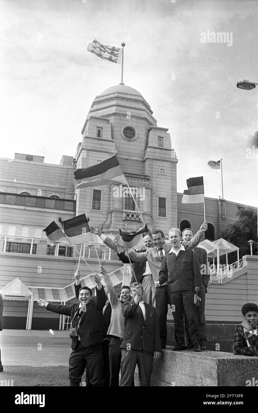 Full Supporting Programme - 1966 World Cup Football - Pictured here today at Wembley Stadium are West German fans who with their flags and enthusiasm, will give the West German team a full supporting programme when they meet England in the Final of the World Cup Tournament today. The West Germans are pictured at Wembley Stadium, where crowds have been gathering since early morning. Many by camping out at the Barn Hill Recreation Ground, under a mile from the stadium. - 30 July 1966 Stock Photo