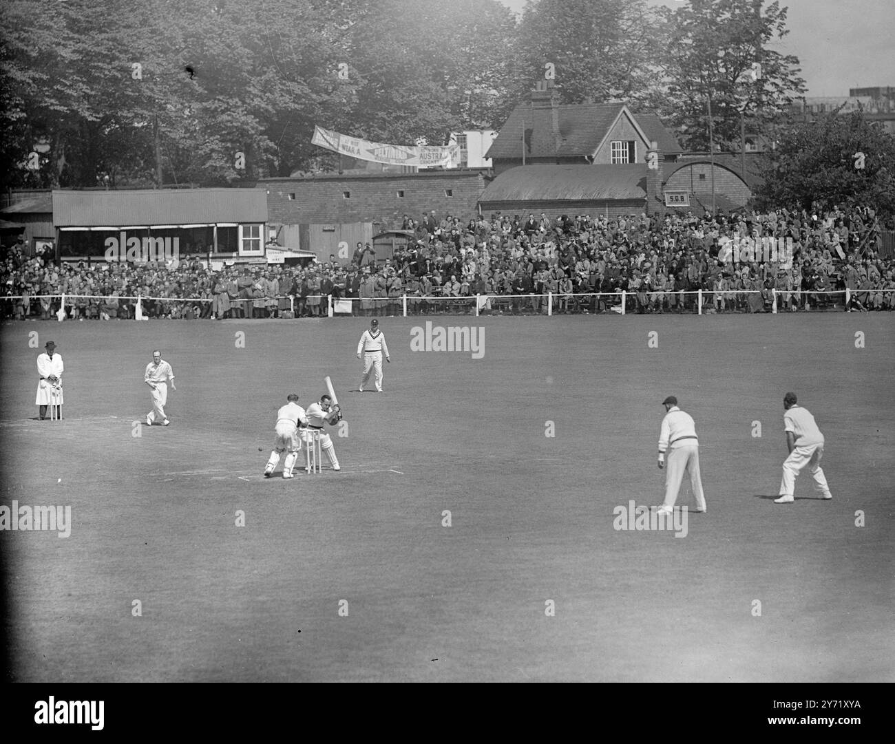 Shown here in action as a batsman is Ian Johnson, 35-year old captain of Victoria, who was selected today (Thursday) to captain Australia against MCC in the first  cricket test beginning at Brisbane on November 26. Johnson, slow to medium off spin bowler, is also a hard-hitting batsman and a fine slip fielder. He was leading wicket taker in Australia last season. Johnson made his Test debut against England at Sydney in 1946 and has played in 24 Test matches, though he has not appeared in the last nine.     18 November 1954 Stock Photo