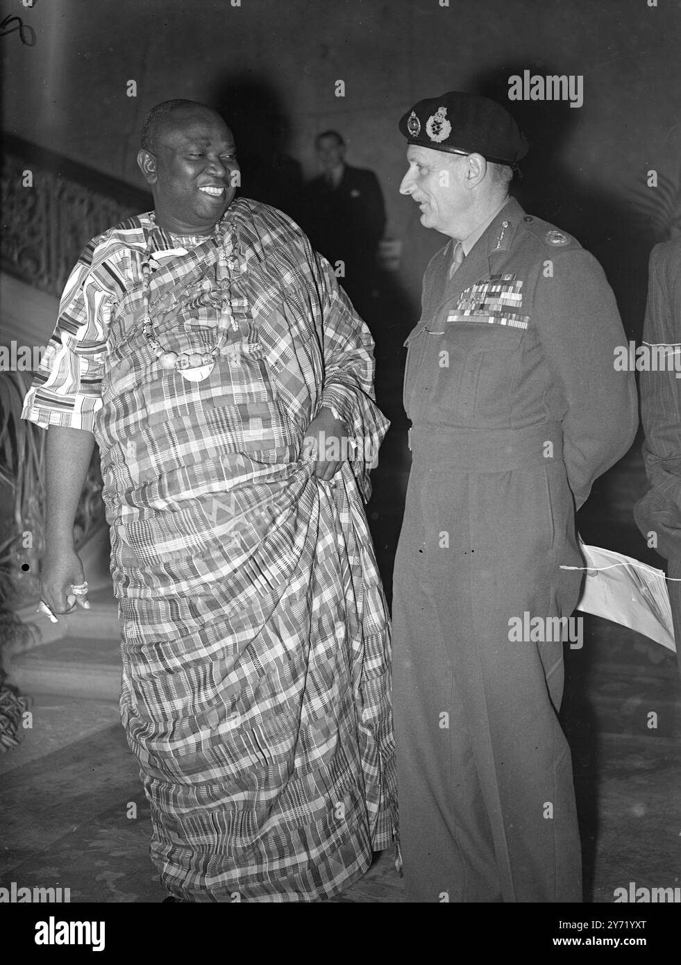 MONTY ATTENDS AFRICAN CONFRERENCE ,   Field Marshal Lord MONTGOMERY , Chief of the Imperial General Staff, visited the African Conference at Lancaster House , London. The conference is being attended by delegates from the legislative councils of all British Africa .     PICTURE SHOWS:-  Field Marshal Montgomery with the Oman Hene of Asib Atandaso , of the Gold Coat , today's session of of the African Conference in London .     OCTOBER 4 1948 Stock Photo