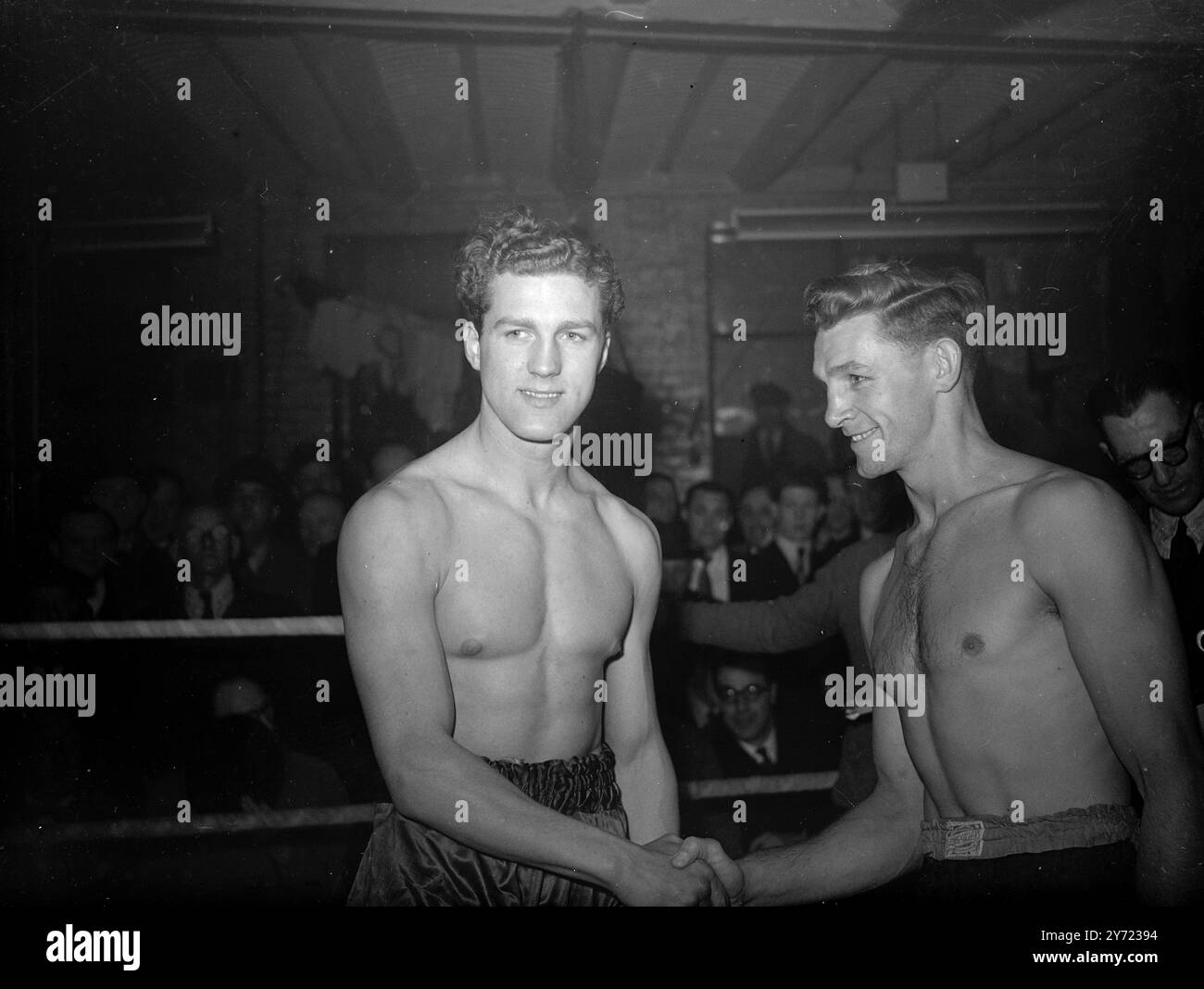 Featherweight Battle Tonight.   Two boxers (names unknown) to compete in an eight-round featherweight contest at Harringay Arena tonight (Tuesday). The boxers weighed in at Jack Solomans' gymnasium this afternoon.    16th March 1948. Stock Photo