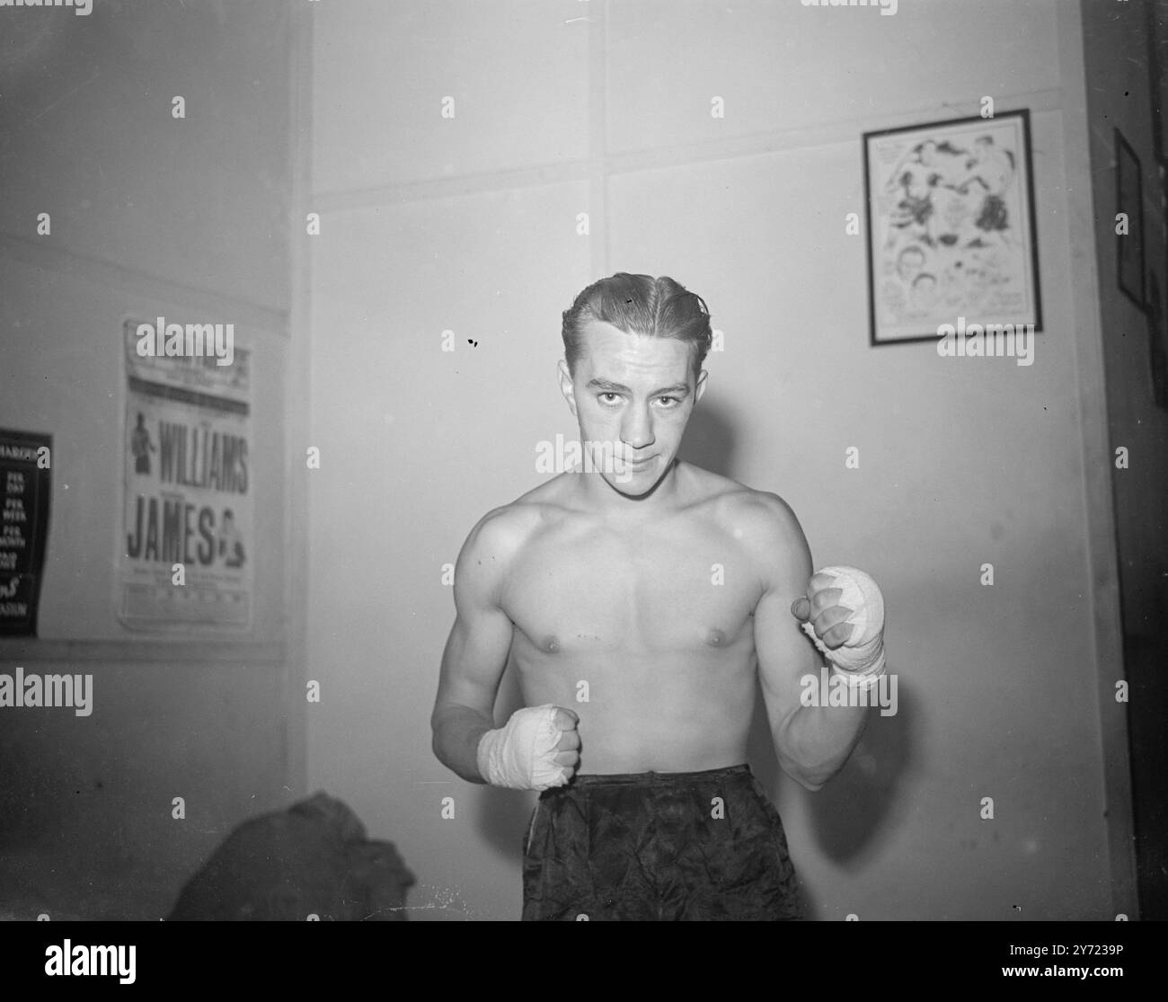 Tony Lombard - S.African Featherweight    One of seven South African boxers recently to invade these islands is featherweight Tony Lombard, a former amateur champion in his own country. Here he is shaping up during training.     23 February 1948 Stock Photo