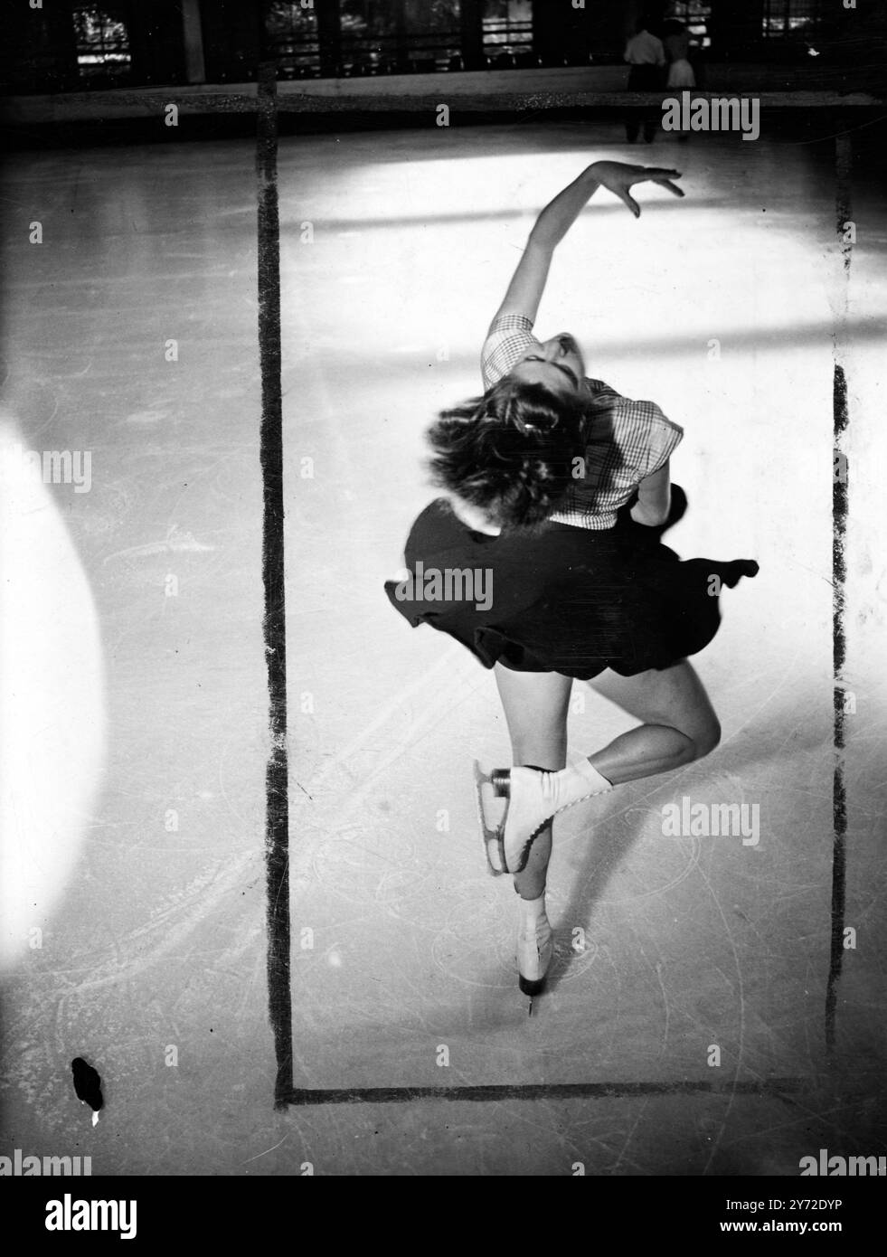 Ice Rink Maya Lin A graceful ballet step is introduced into skating by Swiss champion ...