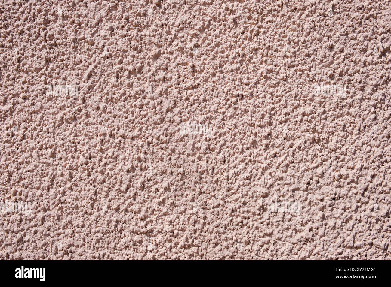 pink painted relief wall background texture Stock Photo