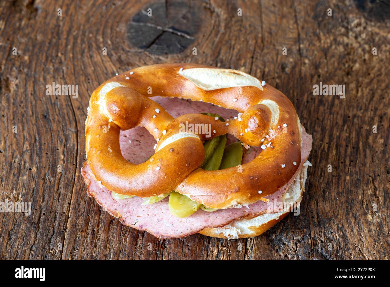 meatloaf slices in a pretzel on wood Stock Photo