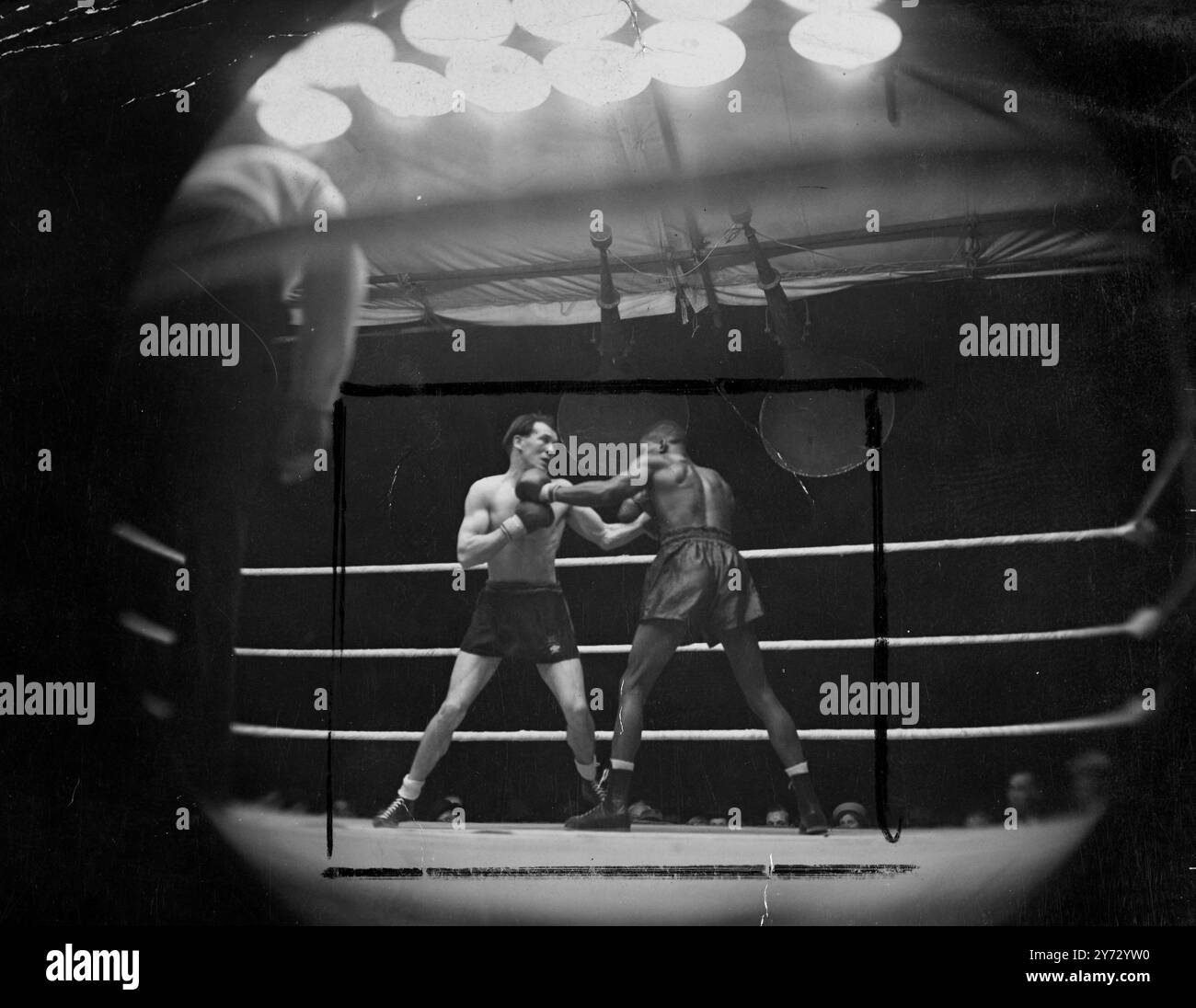 [Original Caption] Ronnie James, the British lightweight champion ...
