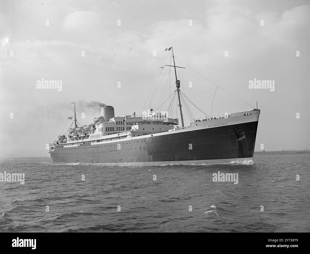 SOUTH AMREICAN BOUND   Seaward bound towards the Warm sunshine of South America , on her maiden voyage , the Royal Mail Lines steam turbine liner '' MAGDALENA '' ( 18,000 tons ) makes a striking picture as she sails down '' Old Father Thames '' from Tilbury , Essex . Built by Harland and Wolff of Belfast , the liner is noted for the streamlining of her distinctive single funnel hull and upper works . Picture taken in the Thames .    9 March 1949 Stock Photo