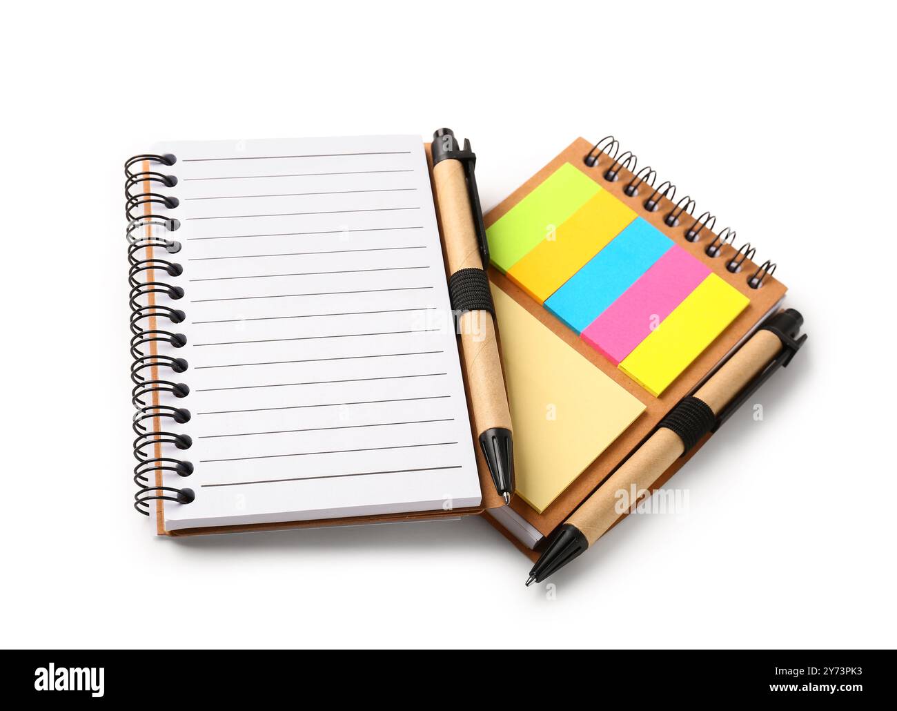 Open notebooks with sticky notes and pens on white background Stock ...