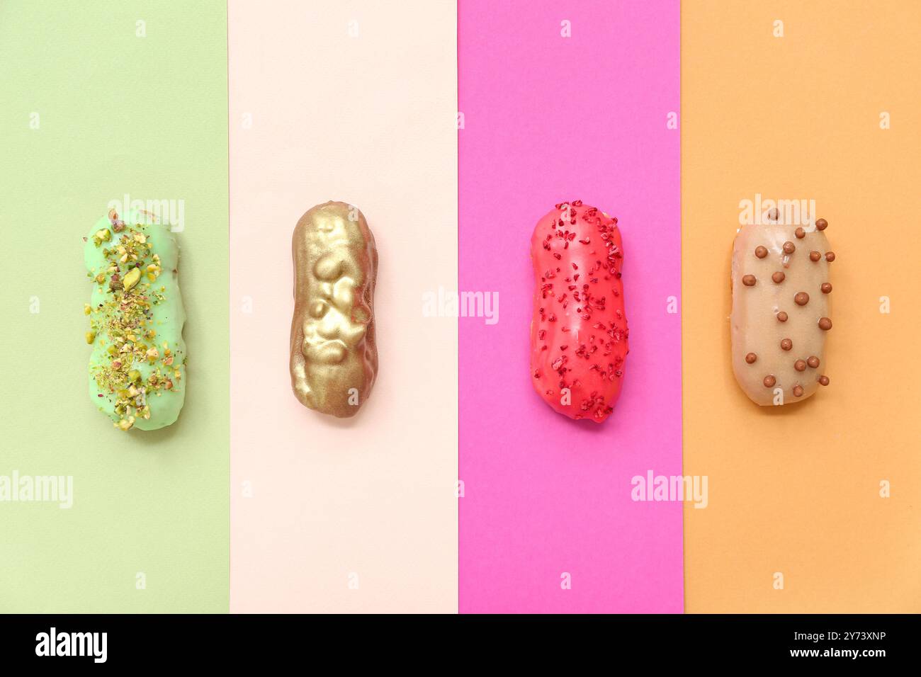 Composition with delicious glazed eclairs on color background Stock Photo