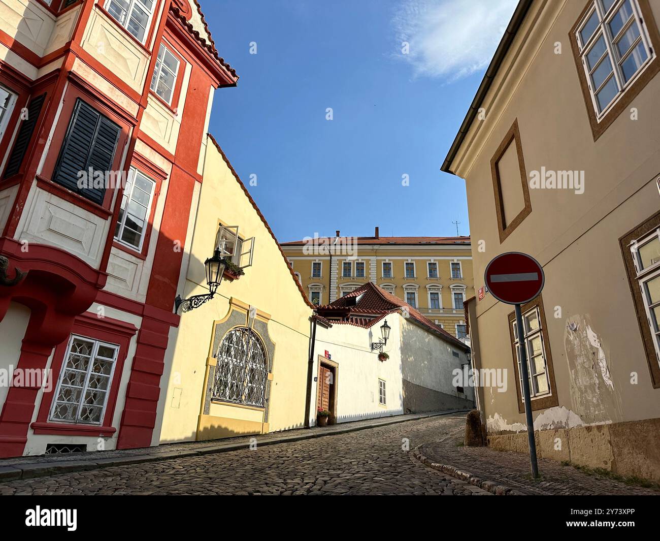 The photograph showcases a medieval European cityscape in summer, featuring vibrant rooftops and intricate architectural details. - Smartphone Captured Stock Image
