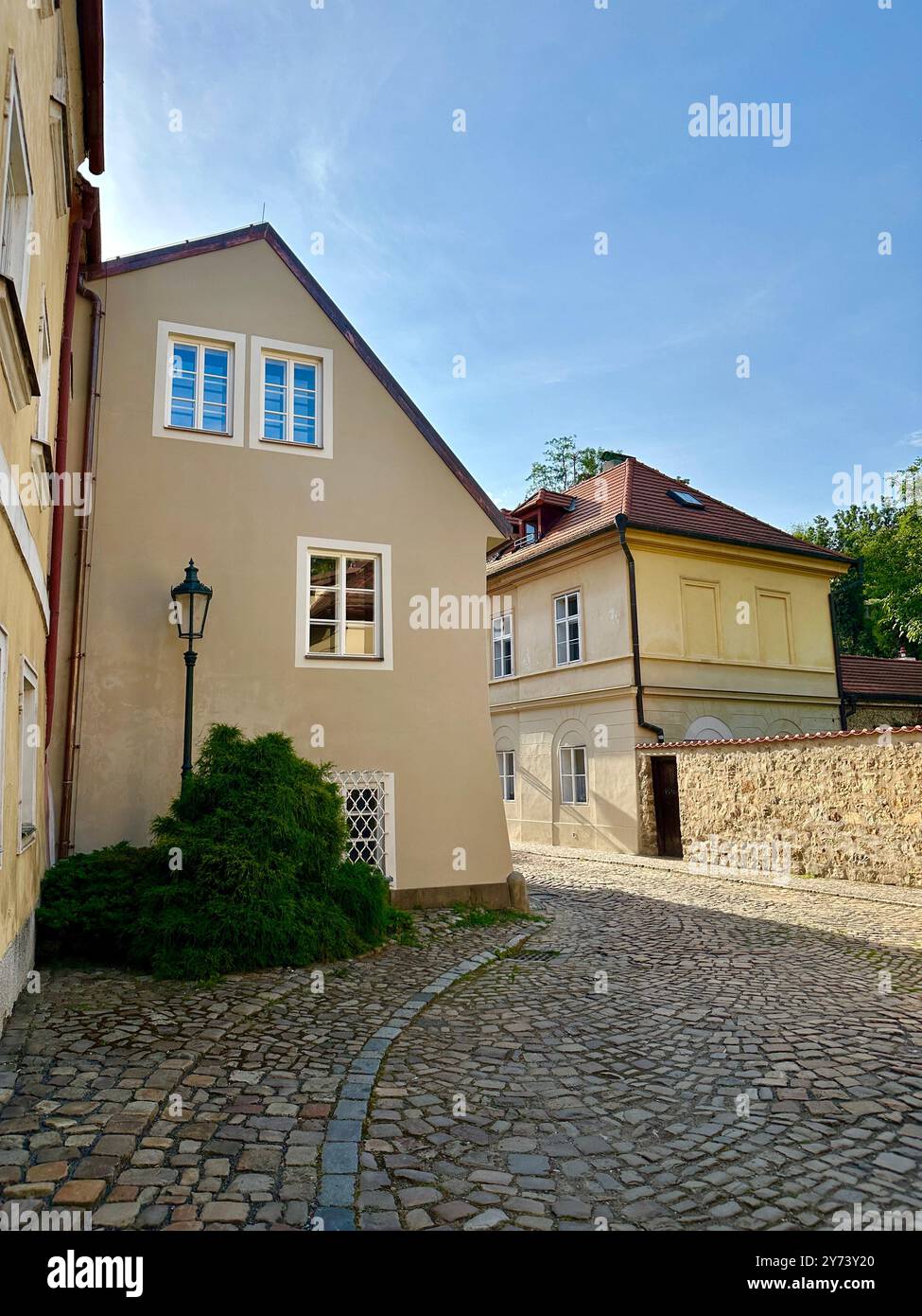 The photograph showcases a medieval European cityscape in summer, featuring vibrant rooftops and intricate architectural details. - Smartphone Captured Stock Image