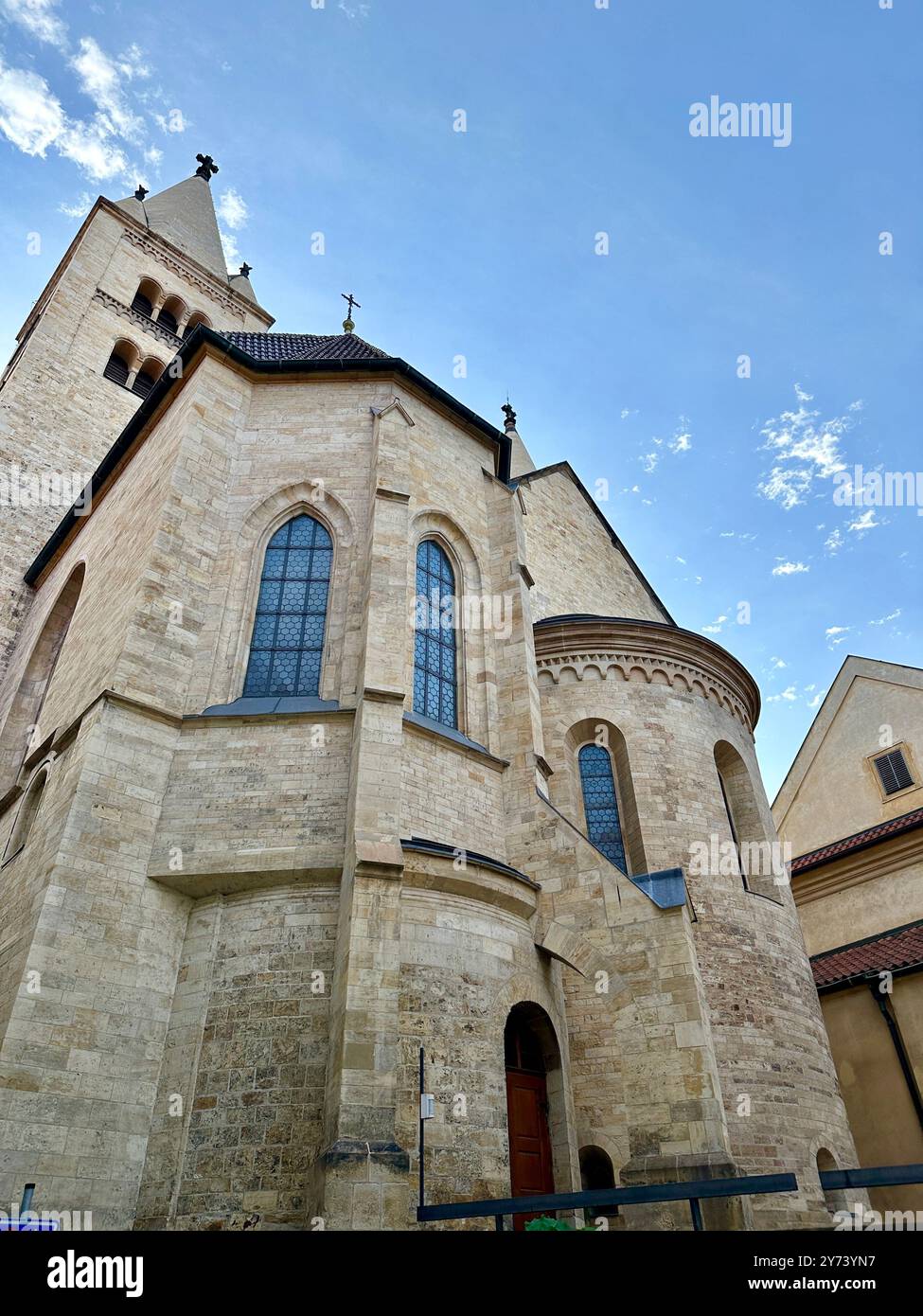 The photograph showcases a medieval European cityscape in summer, featuring vibrant rooftops and intricate architectural details. - Smartphone Captured Stock Image