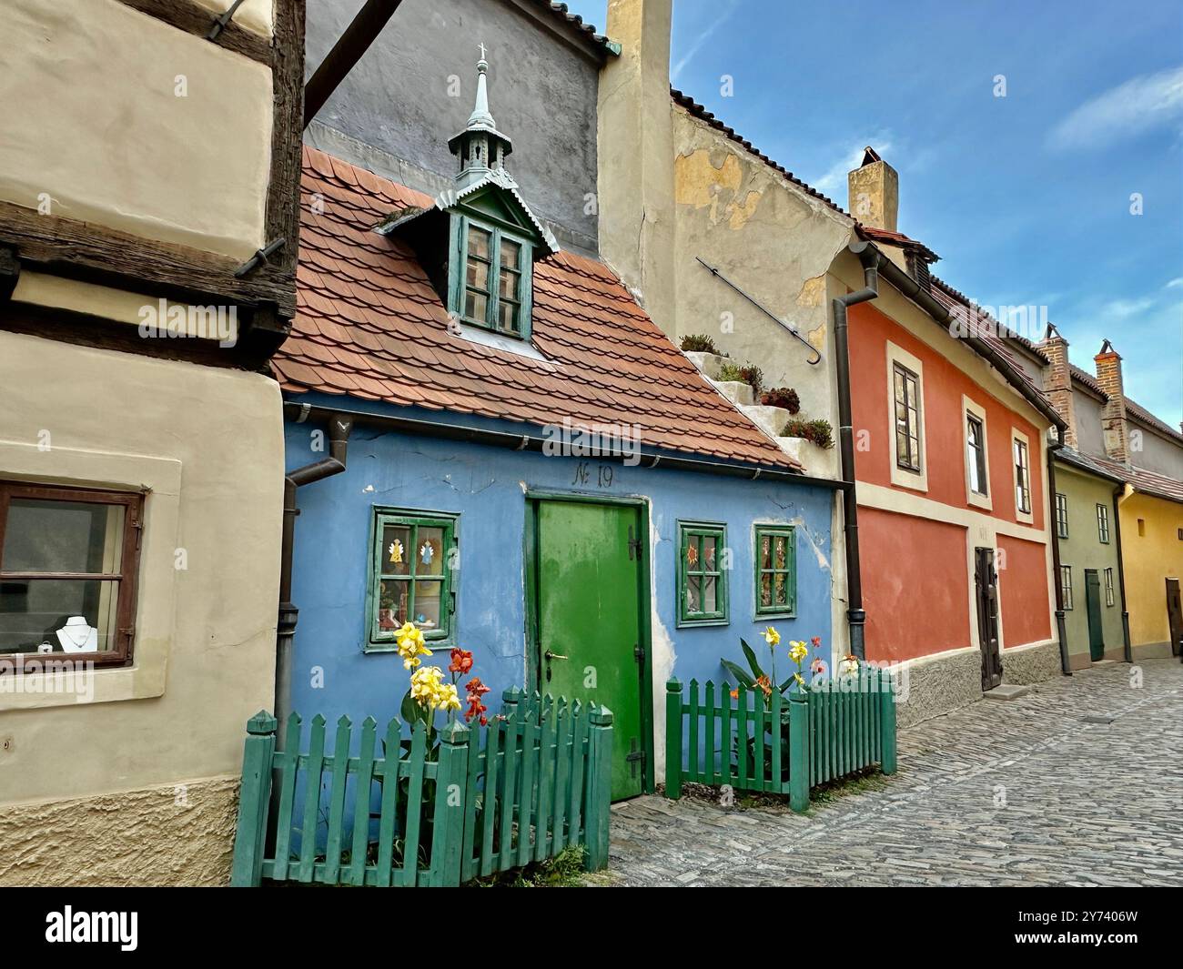 The photograph showcases a medieval European cityscape in summer, featuring vibrant rooftops and intricate architectural details. - Smartphone Captured Stock Image