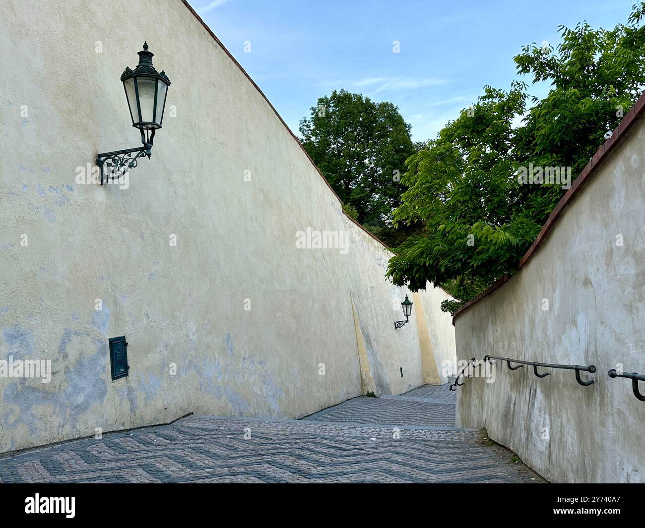 The photograph showcases a medieval European cityscape in summer, featuring vibrant rooftops and intricate architectural details. - Smartphone Captured Stock Image
