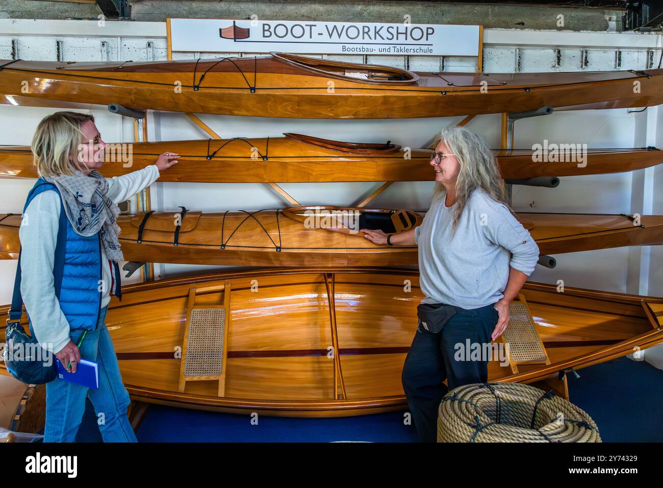 Boat builder Ursula Latus in her workshop in Peenemünde. Fährstraße, Usedom-Nord, Mecklenburg-Vorpommern, Germany Stock Photo