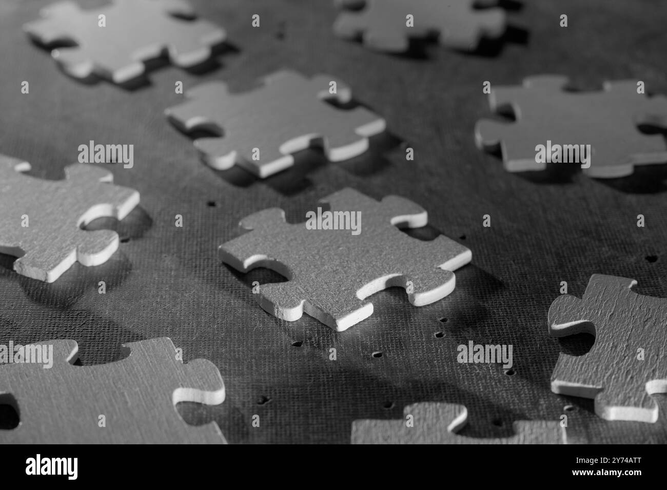 Close up jigsaw puzzle pieces. Abstract business concept,collaboration,cooperation,teamwork makes the dream work, innovation,human resources,recruitme Stock Photo