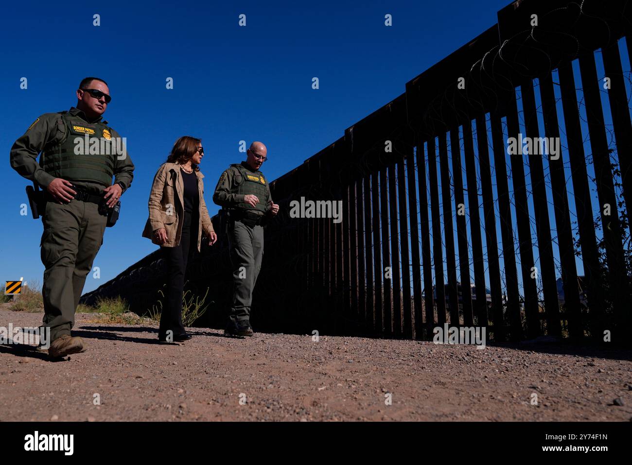 Democratic presidential nominee Vice President Kamala Harris talks with ...