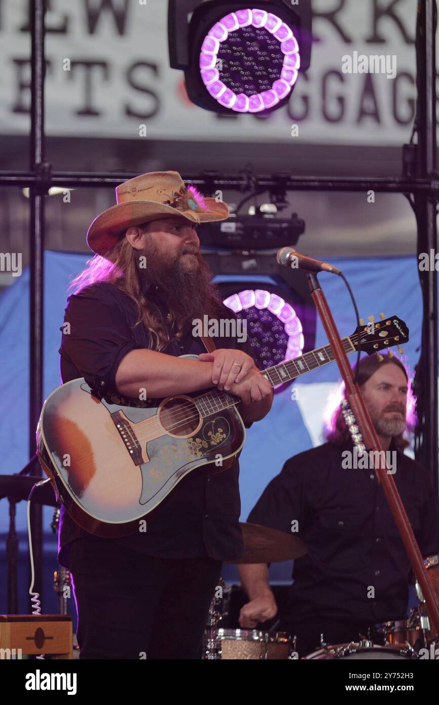 New York, NY - September 27, 2024: Country music star Chris Stapleton and his wife, Morgane Stapleton, perform live on NBC's 'Today' Show at Rockefeller Center in New York City. The couple delivered a soulful set, captivating the crowd with their harmonies and powerful presence. The performance was part of the 'Today' Shows summer concert series, drawing fans from across the city to enjoy the live music experience. Photo: Giada Papini Rampelotto/EuropaNewswire Stock Photo