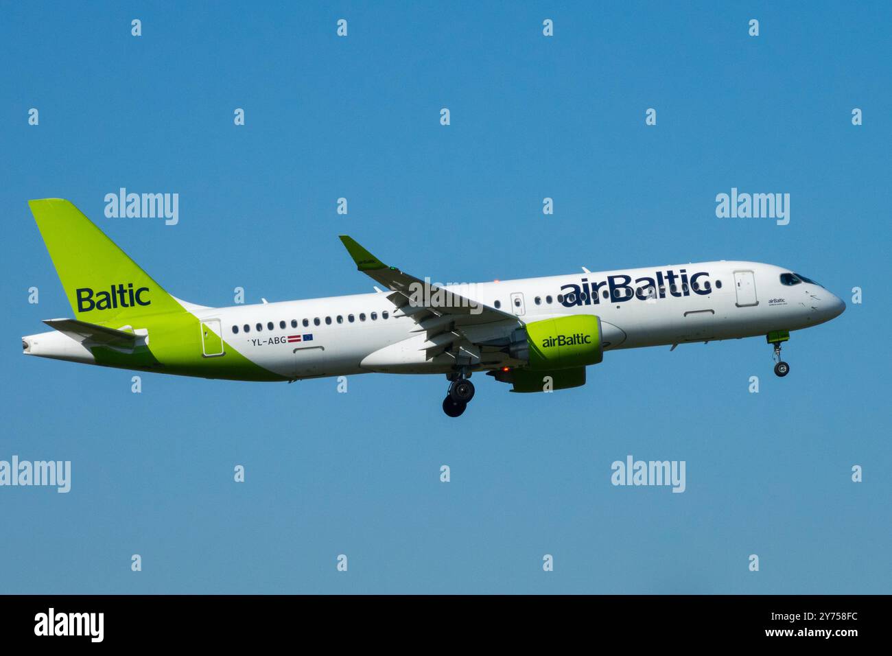 Plane Landing Aircraft Airplane Aeroplane Jetliner Passenger Jet Airliner AirBaltic Airline Airways Airlines Operated Flying Flight Approaches Berlin Stock Photo
