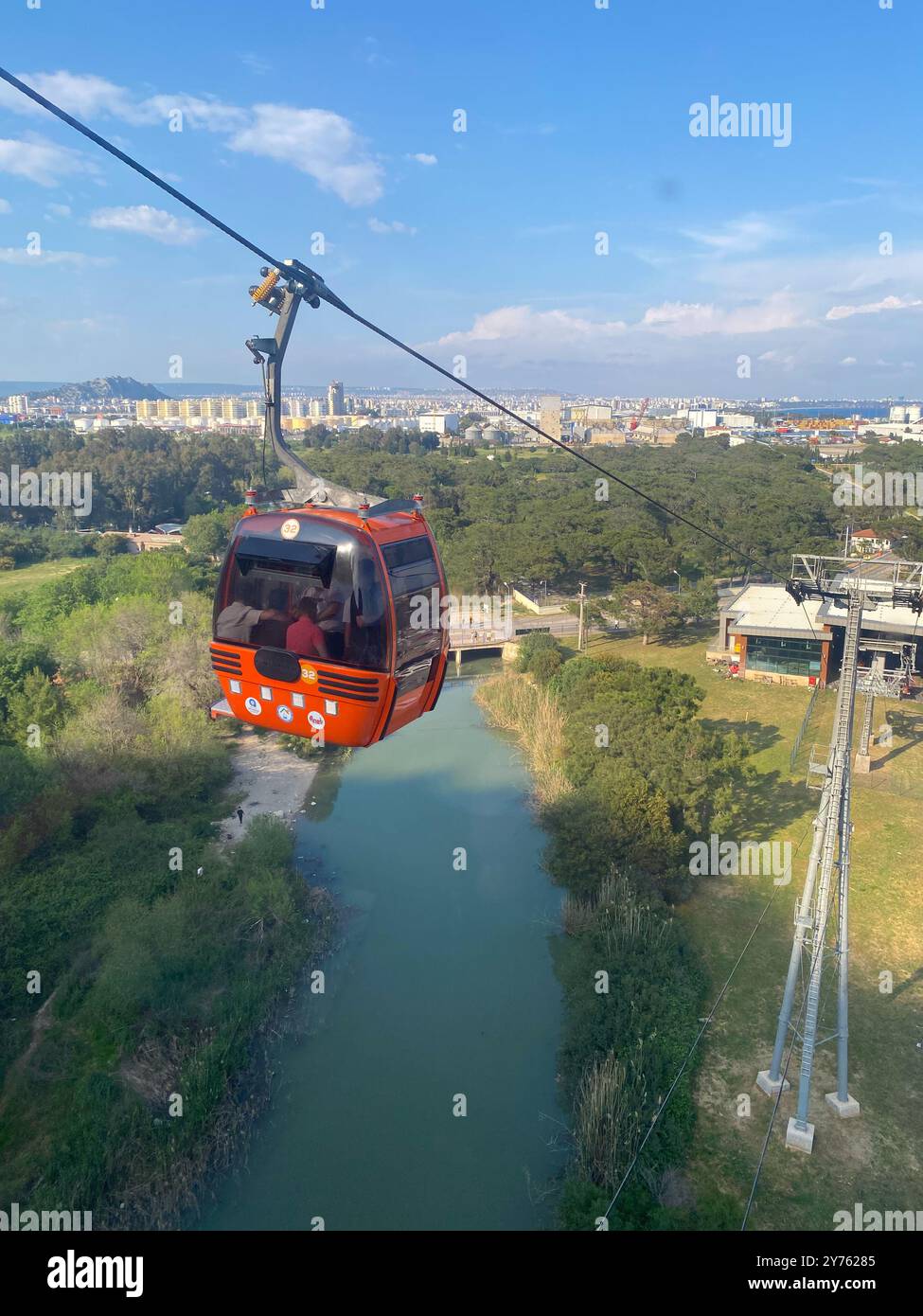 The Tunektepe cable car near Antalya in Turkey is a popular tourist attraction offering picturesque views as you climb above the clouds. - Smartphone Captured Stock Image