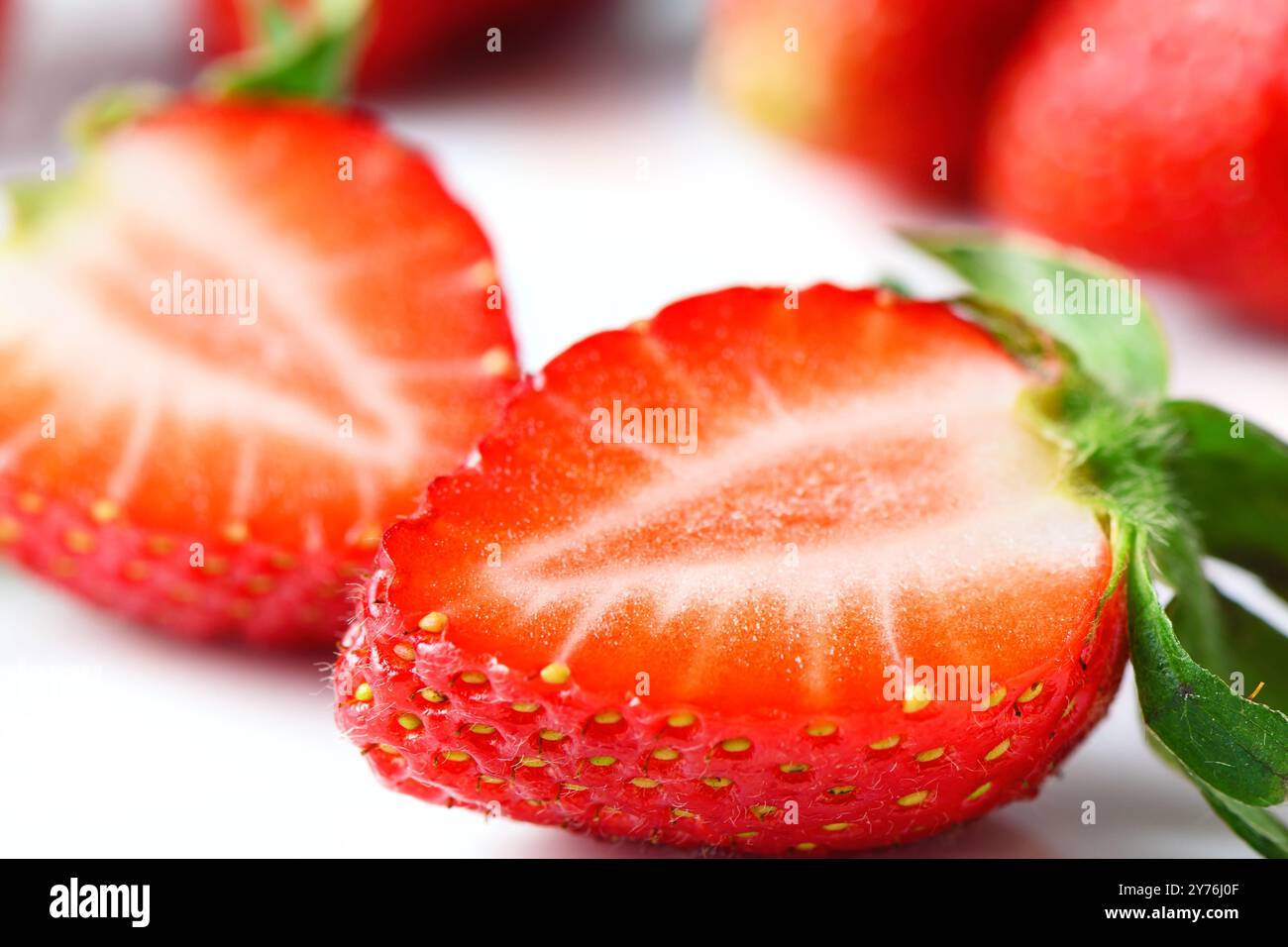 Fresh strawberries isolated on white background Stock Photo - Alamy