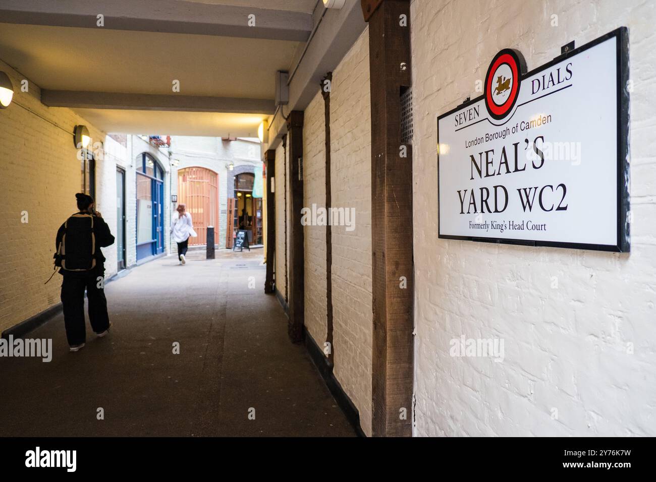 London, UK - July 25, 2024: Colurful Neals Yard courtyard. Neal's Yard is a small alley in London's Covent Garden. Popular tourist spot. Stock Photo