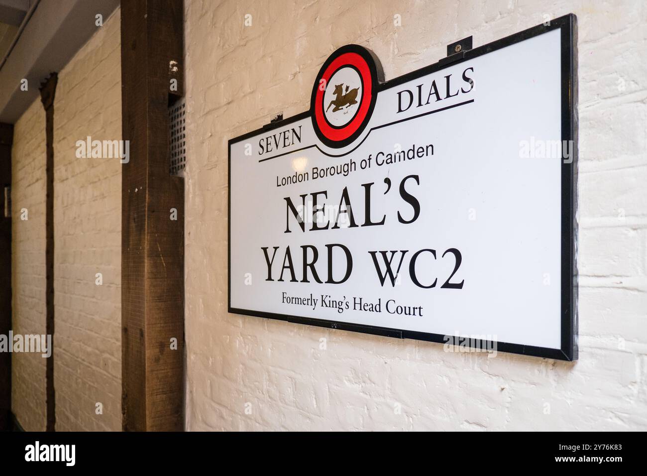 London, UK - July 25, 2024: Colurful Neals Yard courtyard. Neal's Yard is a small alley in London's Covent Garden. Popular tourist spot. Stock Photo