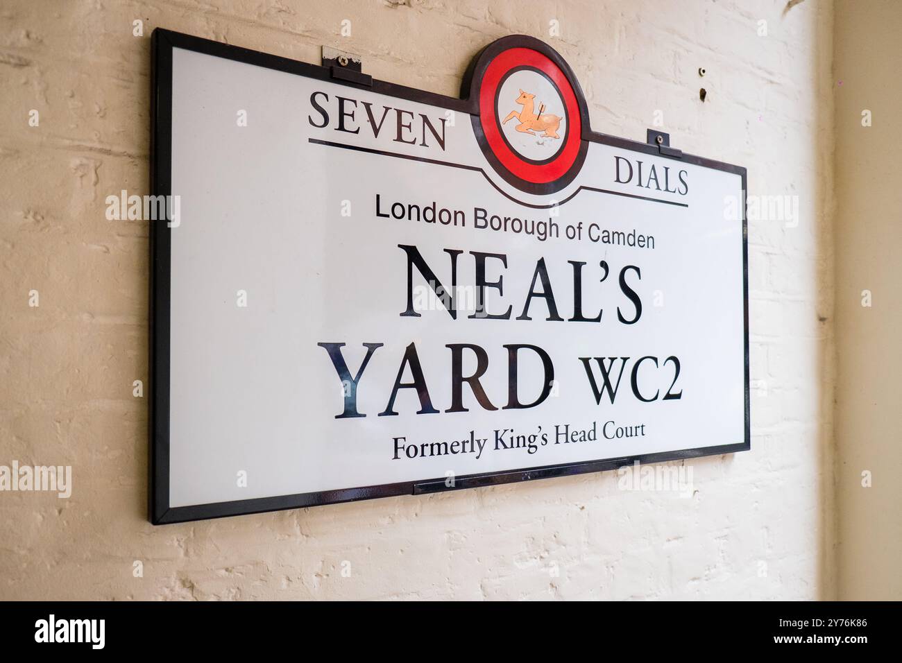 London, UK - July 25, 2024: Colurful Neals Yard courtyard. Neal's Yard is a small alley in London's Covent Garden. Popular tourist spot. Stock Photo
