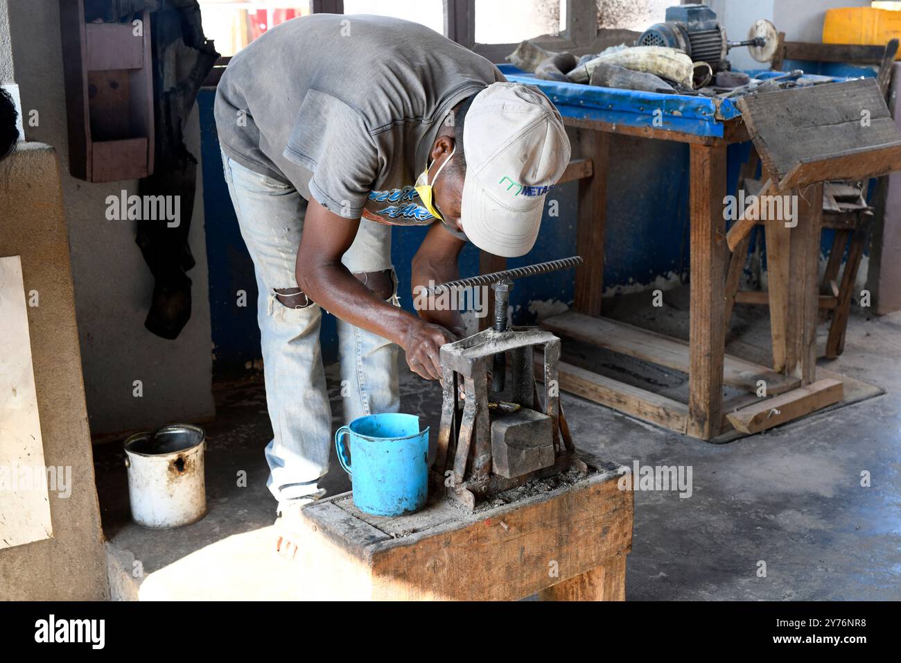 Antsirabe, workshop on making objects with zebu horn. Artisanal worker. Vakinankaratra region, Madagascar. Stock Photo