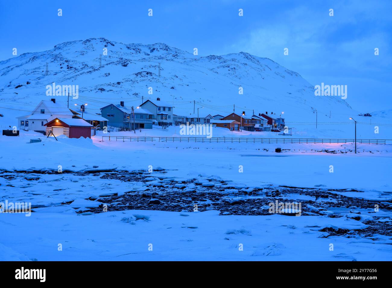Skarsvåg village, Nordkapp municipality, during a blue hour on a snowy winter day (Nordkapp, Finnmark, Norway) ESP: Pueblo de Skarsvåg, en Nordkapp Stock Photo