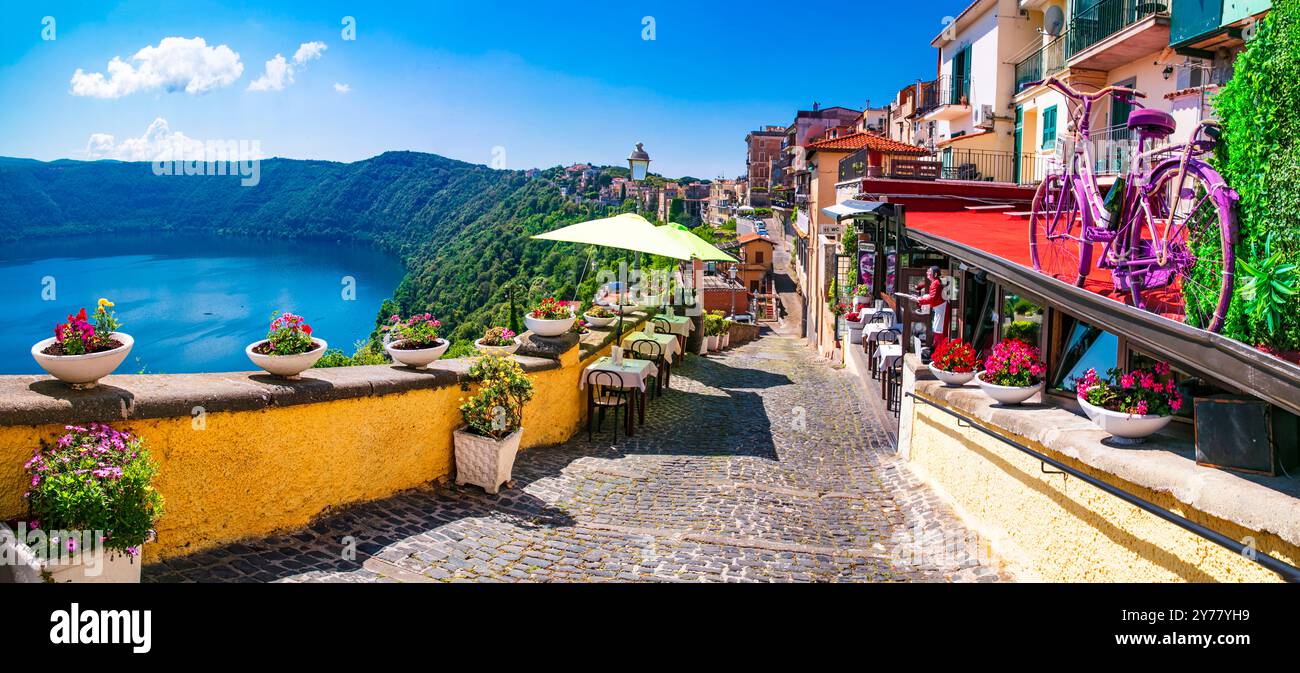 Most scenic lakes of Italy - volcanic Albano lake ,  charming floral streets of Castel Gandolfo village and crater of volcano. popular touristic site Stock Photo