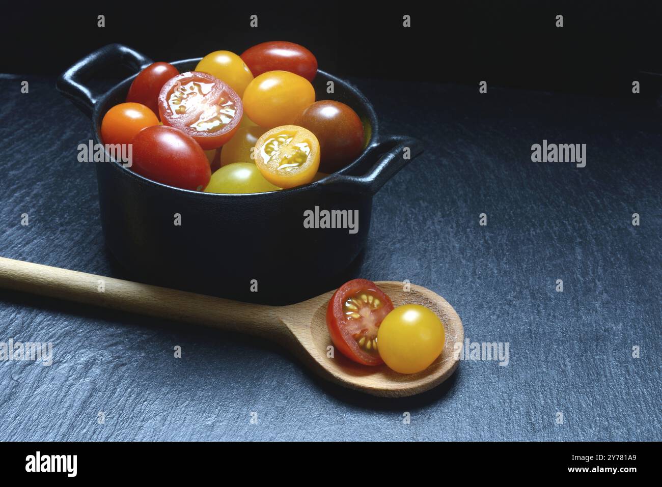 Various cherry tomatoes in pots, cherry tomato Stock Photo