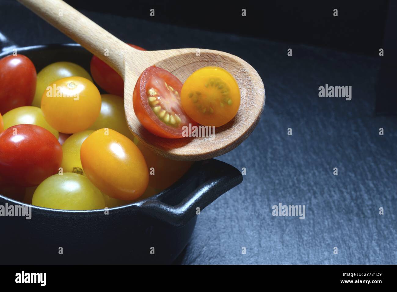 Various cherry tomatoes in pots, cherry tomato Stock Photo
