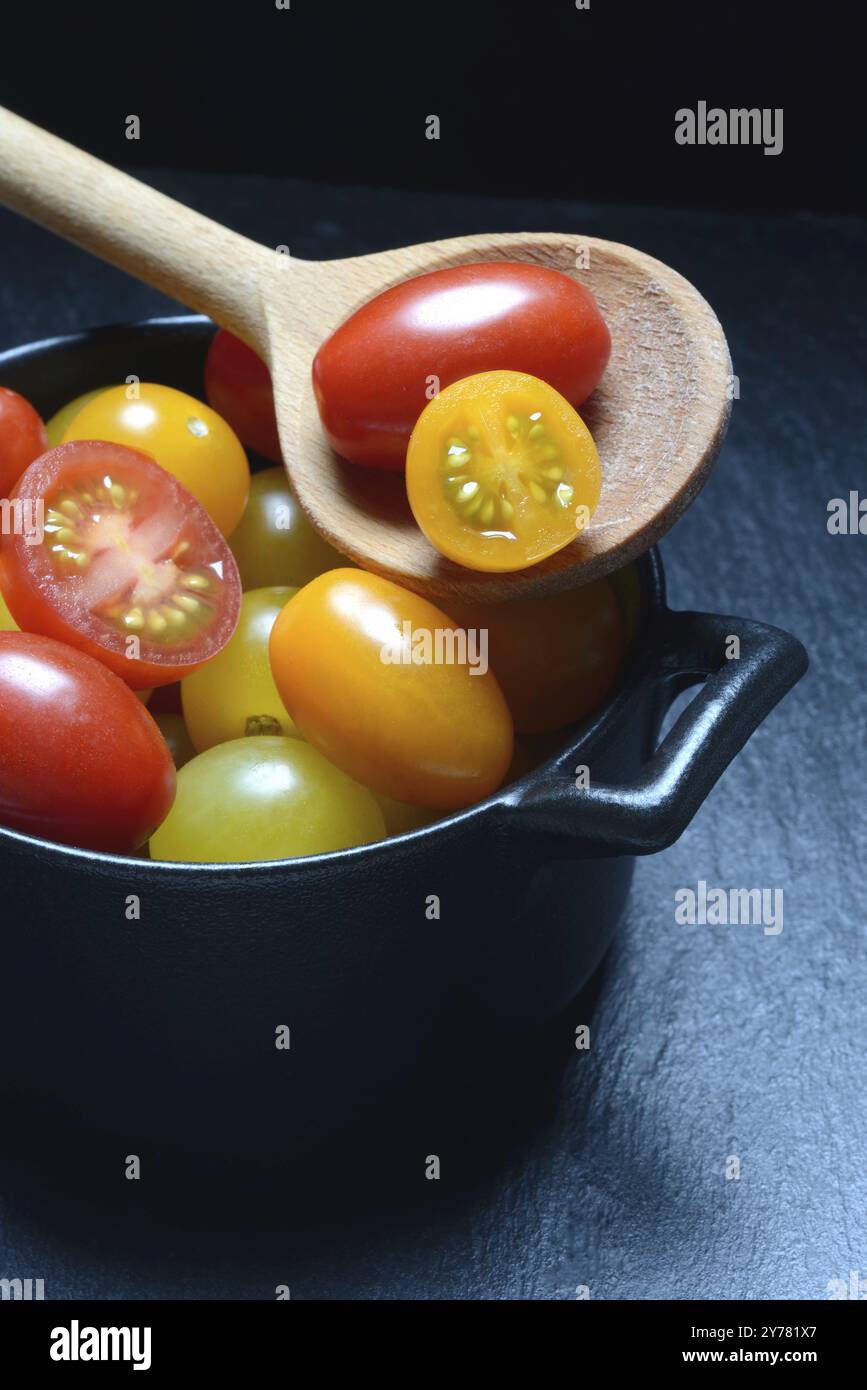 Various cherry tomatoes in pots, cherry tomato Stock Photo
