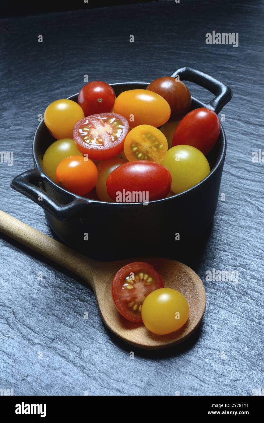 Various cherry tomatoes in pots, cherry tomato Stock Photo