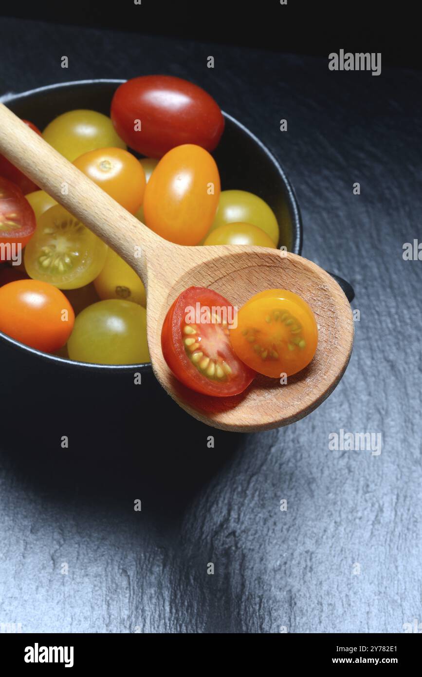 Various cherry tomatoes in pots, cherry tomato Stock Photo