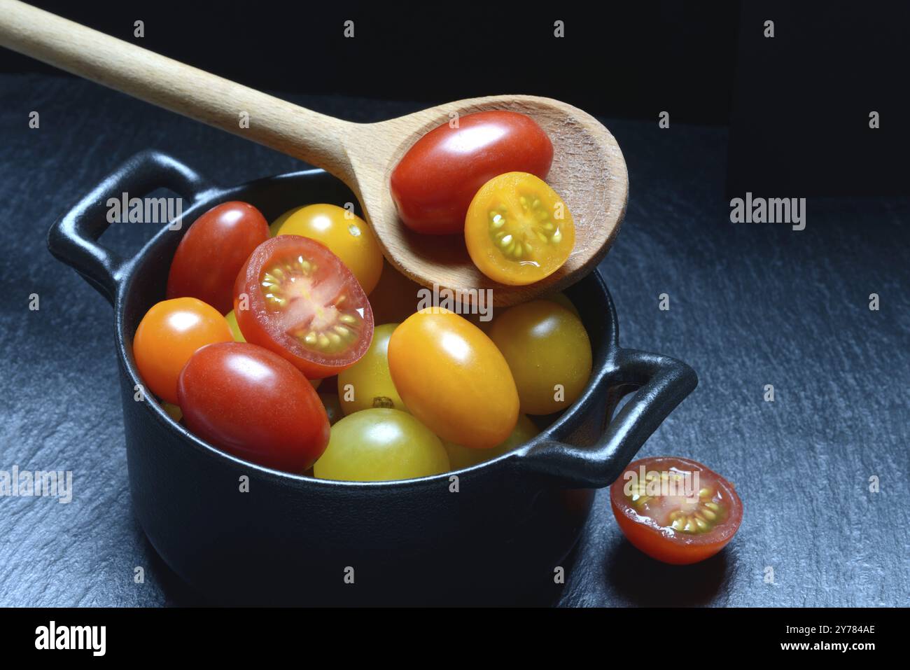 Various cherry tomatoes in pots, cherry tomato Stock Photo