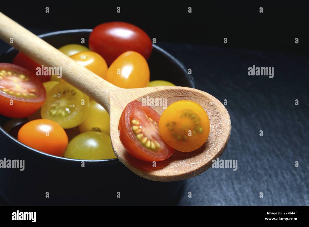 Various cherry tomatoes in pots, cherry tomato Stock Photo