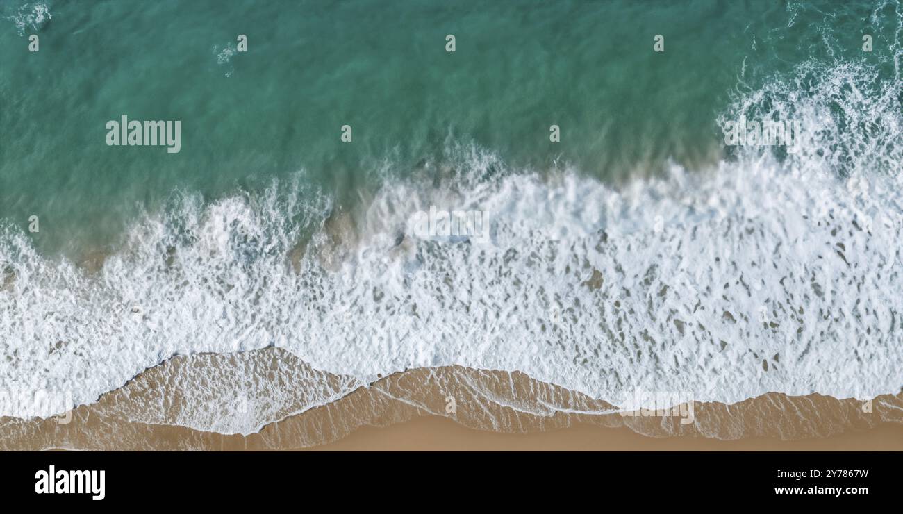 Waves crash onto beach hi-res stock photography and images - Alamy