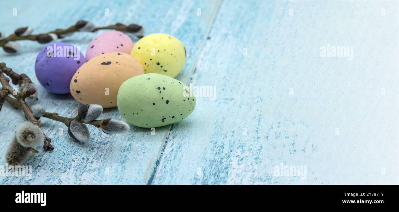 Happy Easter. Easter eggs. Willow twigs. Holy Easter. Blue background Stock Photo