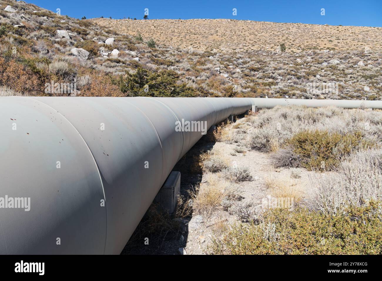 Water Pipeline for a hydroelectric penstock in the high desert near Bishop California Stock Photo