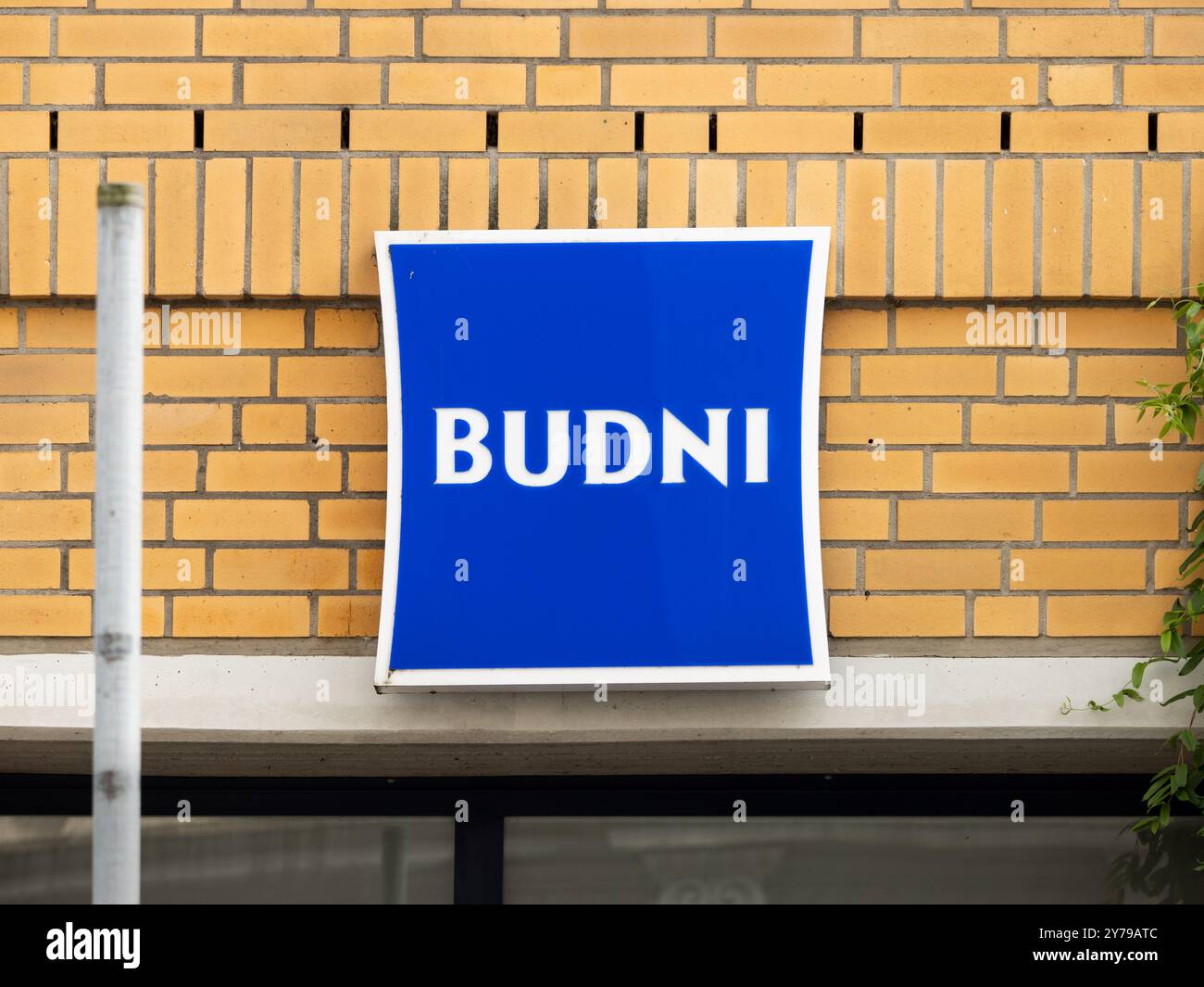 Budni logo sign of the drugstore. The company is called Budnikowsky and the most retail stores are located in the region of Hamburg city. Stock Photo