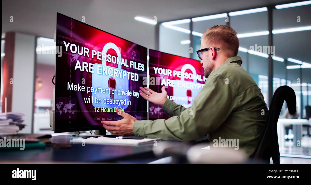 Ransomware Malware Cyber Attack On Business Computer Stock Photo