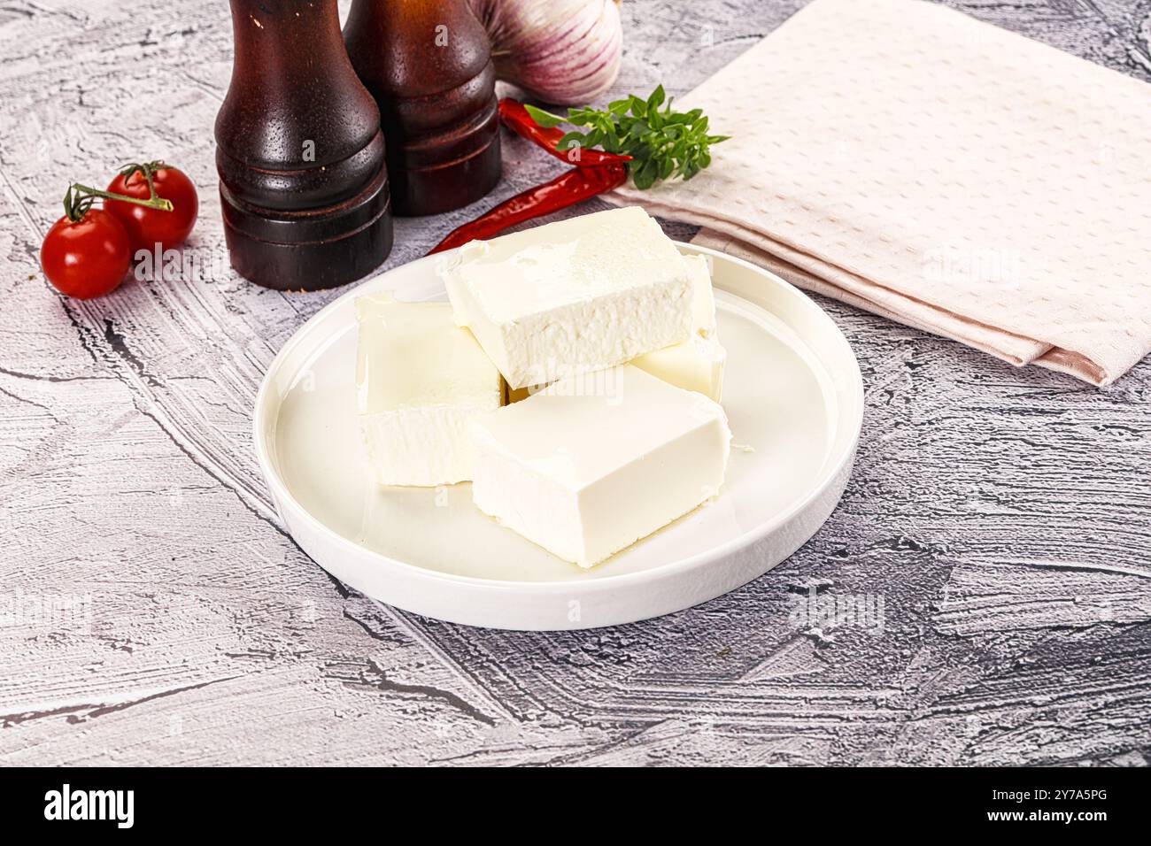 Greek traditional cuisine - Feta cheese bricks Stock Photo - Alamy