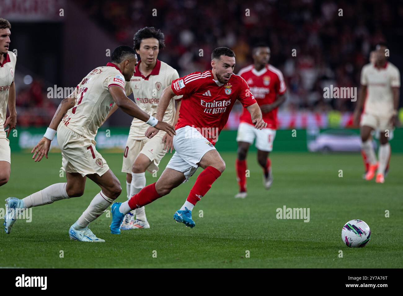 Lisbon, Portugal. 28th Sep, 2024. Orkun Kökçü of SL Benfica with Kanya Fujimoto and Jordi Mboula of Gil Vicente FC during the Liga Portugal Betclic match between SL Benfica and Gil Vicente FC at Estadio da Luz on September 28, 2024 in Lisbon, Portugal. (Final score: SL Benfica 5 - 1 Gil Vicente) Credit: SOPA Images Limited/Alamy Live News Stock Photo