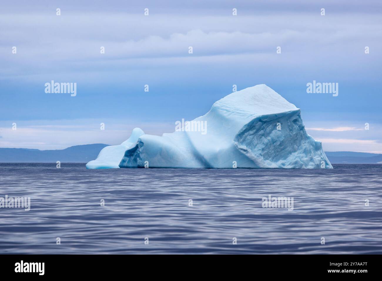 Blue iceberg in the cold, blue waters of the Arctic Ocean at Bontekoe ...