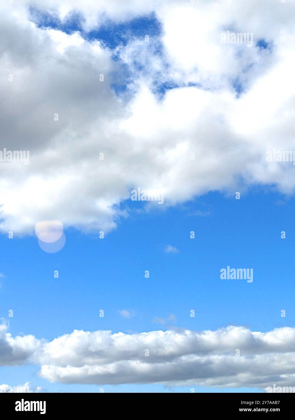 Fluffy White Clouds in a Blue Sky as A Skyscape Background Stock Photo ...