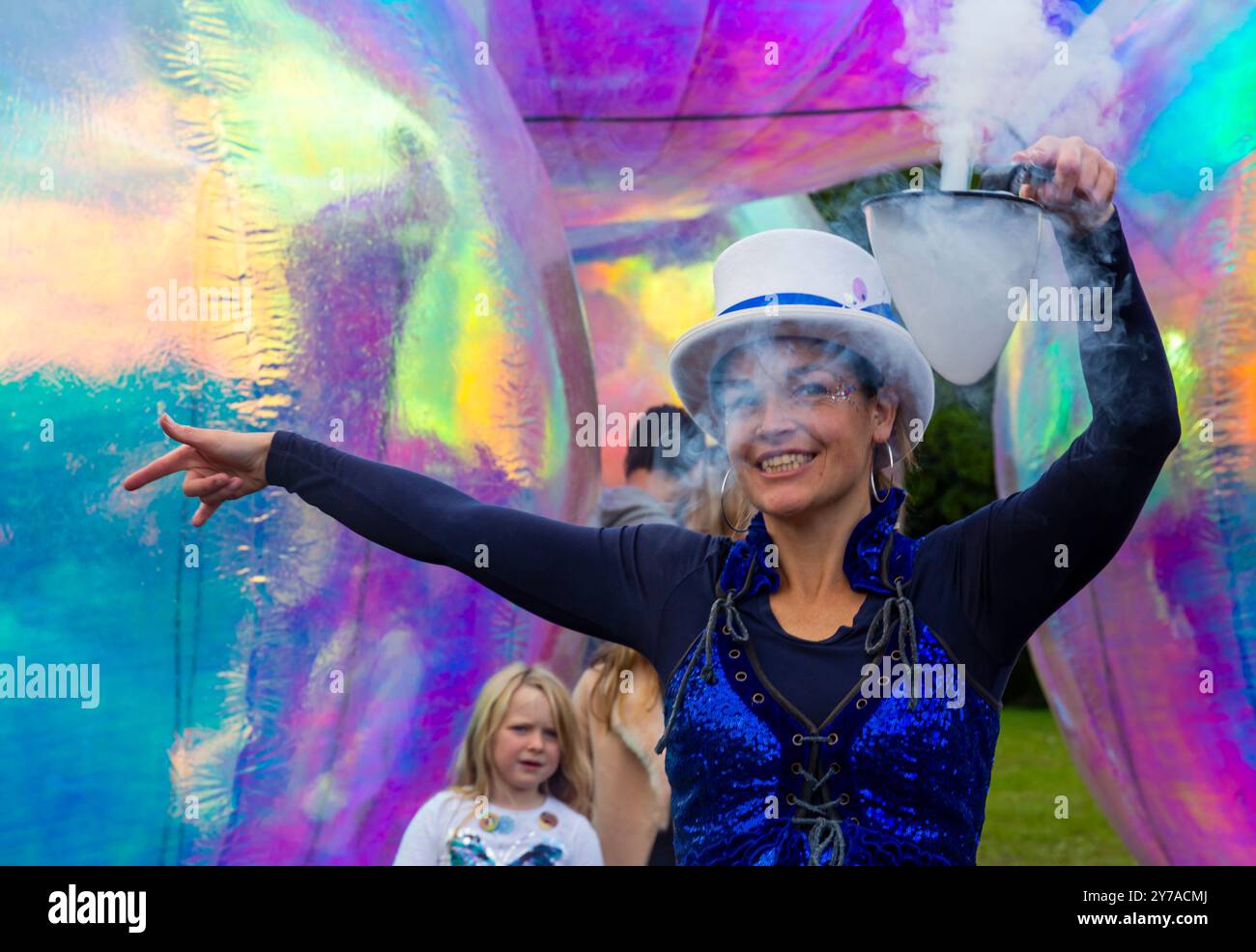 Bournemouth, Dorset, UK. 28th September 2024. Thousands flock to Bournemouth for the Arts by the Sea Festival with the theme of Taste, a fun time with quirky theatre, dance and music, providing spectacular shows and inspirational installations for free family entertainment. Audience young and old enjoy the Bubble Spectacular by Squidge & Pop. Credit: Carolyn Jenkins/Alamy Live News Stock Photo