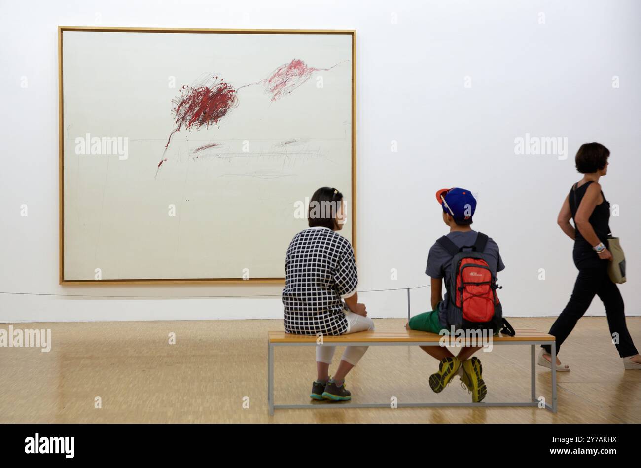 People looking at art in a museum, Achilles Mourning the Death of