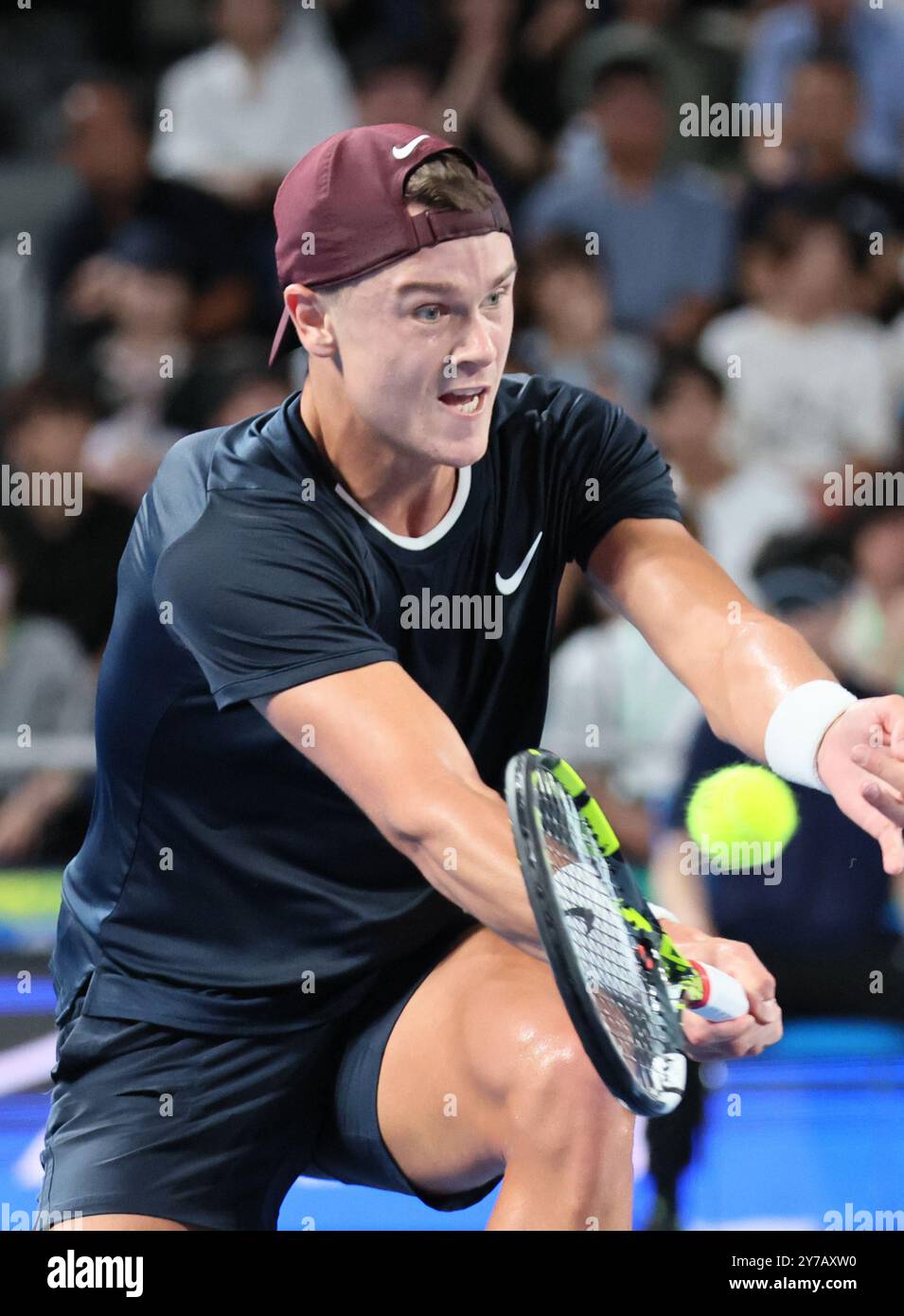 September 29, 2024, Tokyo, Japan - Holger Rune of Denmark retuens the ...