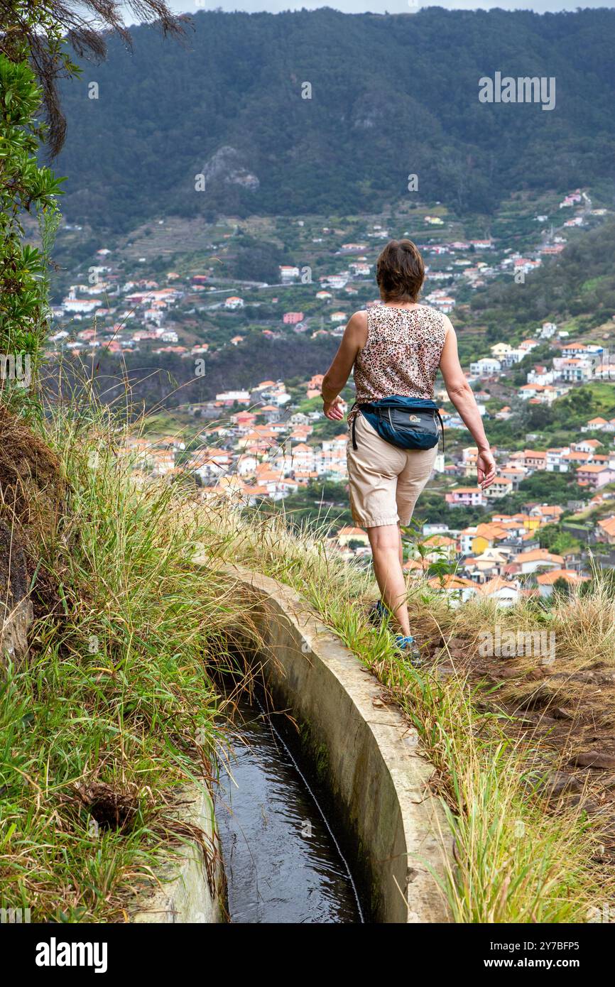walking-along-the-levada-dos-maro-os-a-levada-on-the-portuguese-island